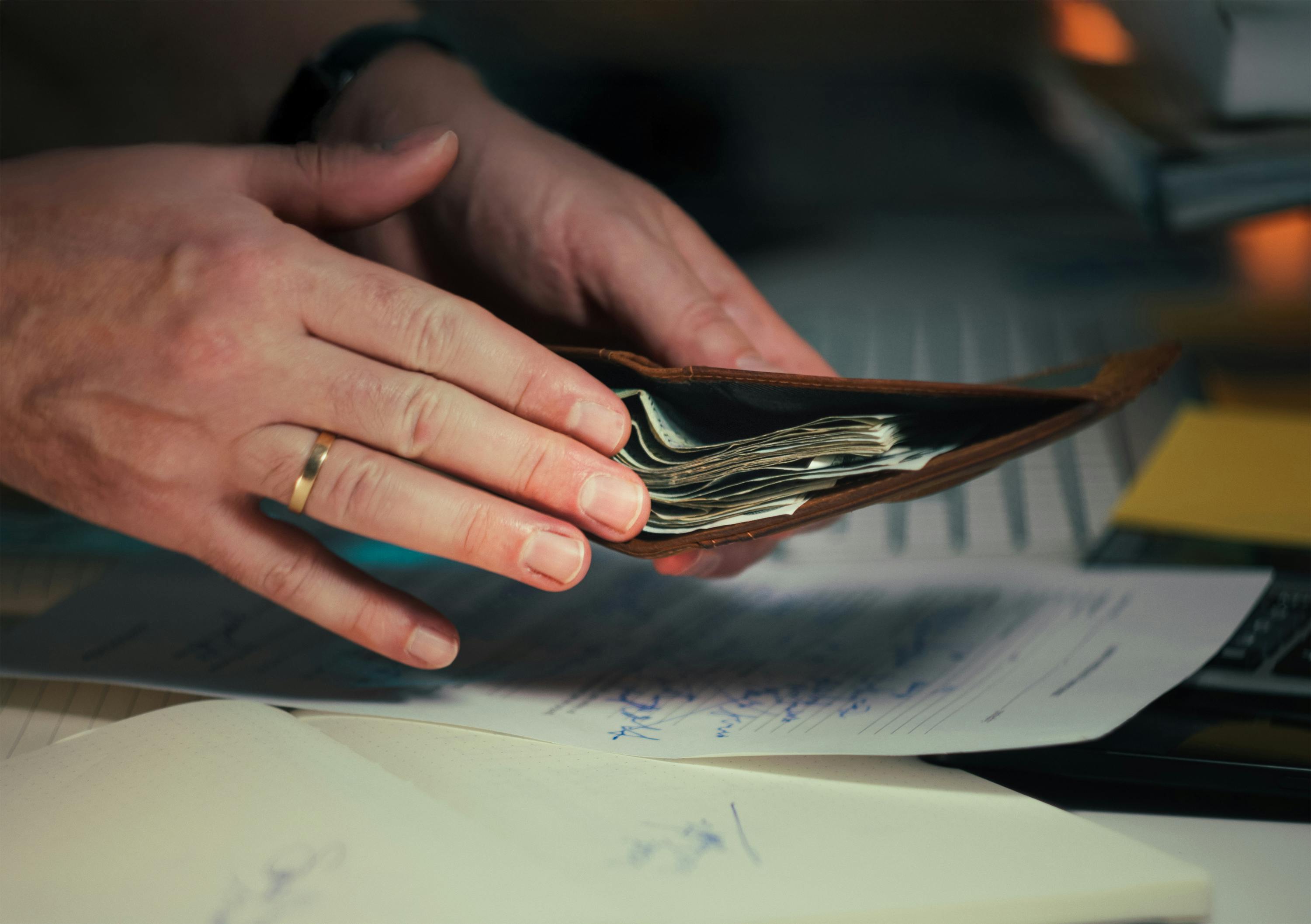 Cash wallet and financial documents under review